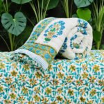 teal-blue-floral-jaipuri-hand-quilted-reversible-razai
